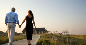 lonely couples holding hands beach